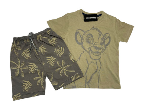 Children's t-shirt with cartoon character and shorts with leaf pattern on a white background